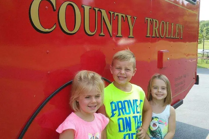 a little girl posing for a picture