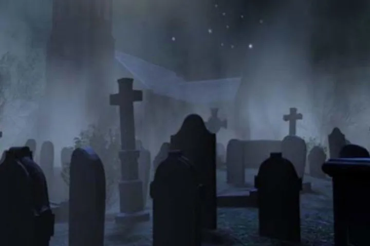 a couple of people that are standing in the dark