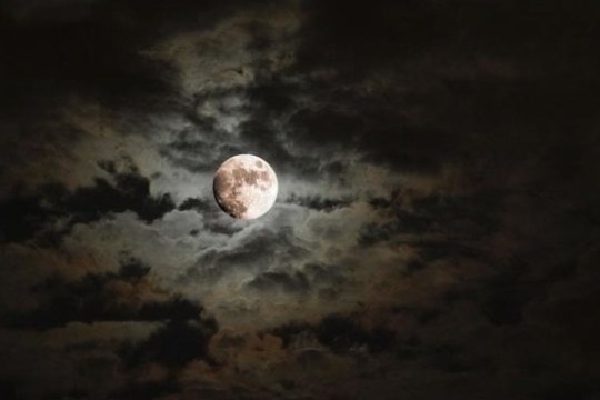 a close up of clouds in the dark