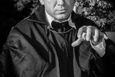 a man wearing a suit and tie