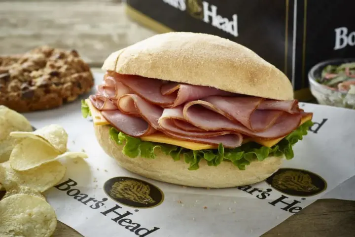 a cut in half sandwich sitting on top of a table