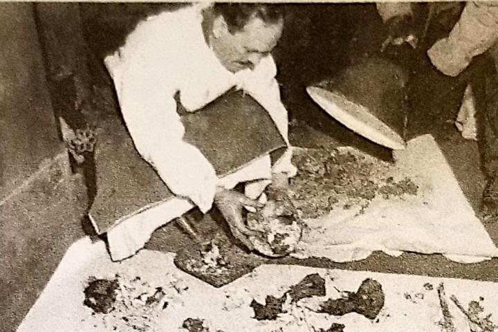 a group of people sitting on the ground