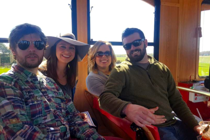 a group of people sitting on a bus