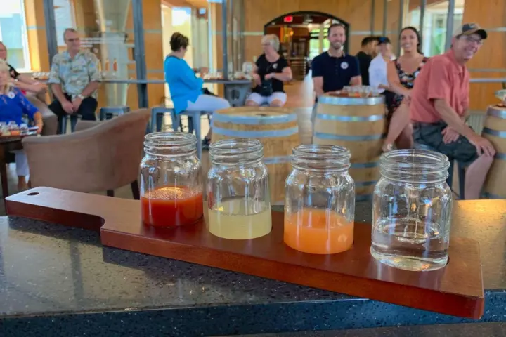 a group of people sitting at a table in a restaurant