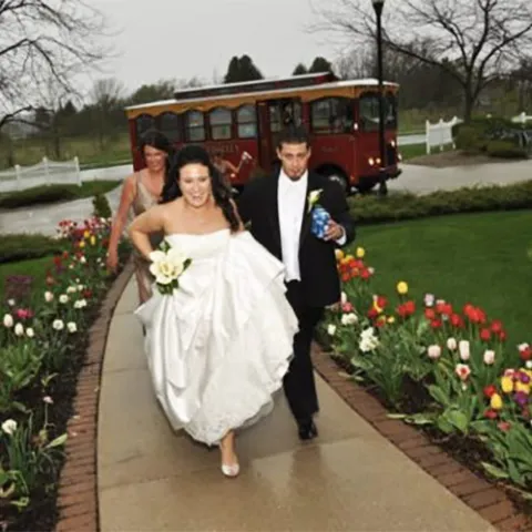 a woman standing on a sidewalk