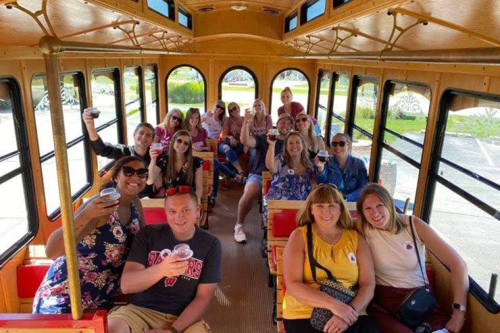 a group of people sitting posing for the camera