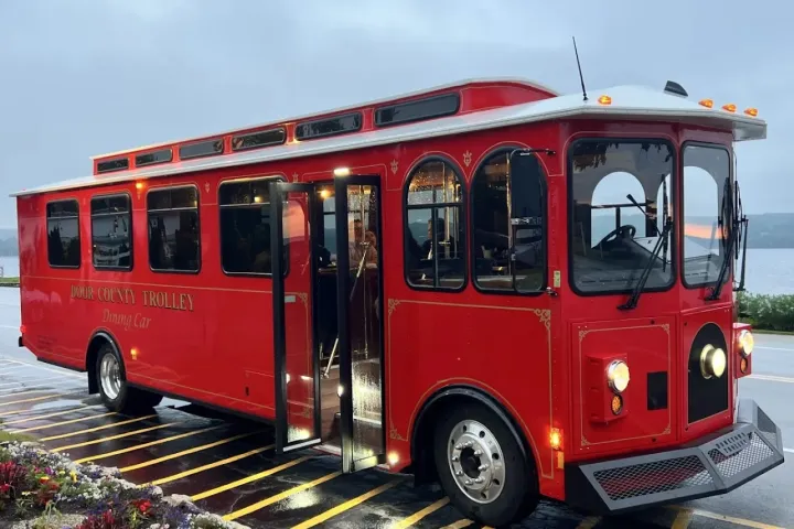 a colorful bus parked in a parking lot